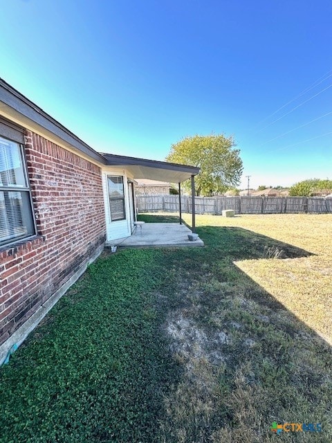 view of yard with a patio area