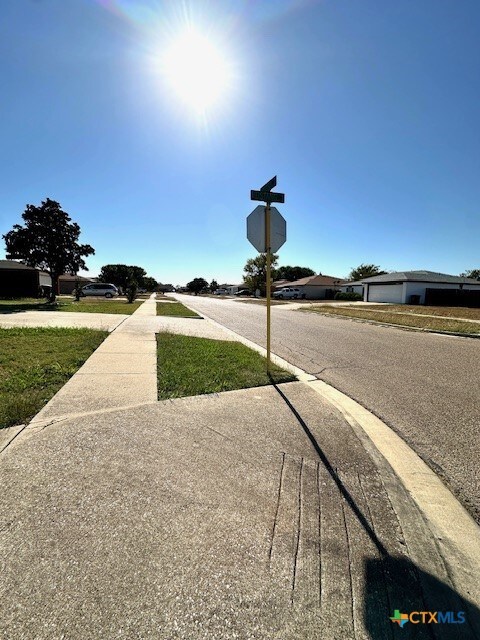 4505 Mustang Dr, Killeen, TX 76549 - view of road with traffic signs and sidewalks
