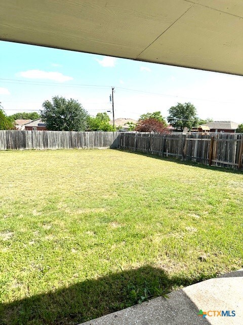 4505 Mustang Dr, Killeen, TX 76549 - view of yard with a fenced backyard