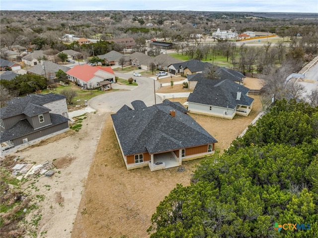 drone / aerial view with a residential view