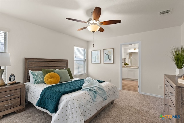 5002 Rose Garden Loop, Killeen, TX 76542 - bedroom featuring a ceiling fan, visible vents, light colored carpet, baseboards, and ensuite bath