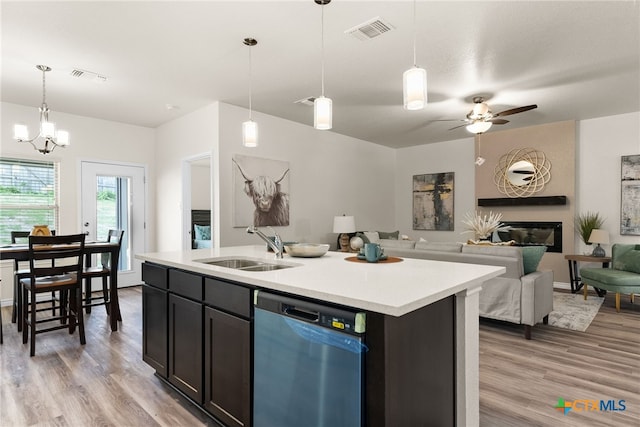 5002 Rose Garden Loop, Killeen, TX 76542 - kitchen with visible vents, open floor plan, light countertops, a sink, and dishwasher