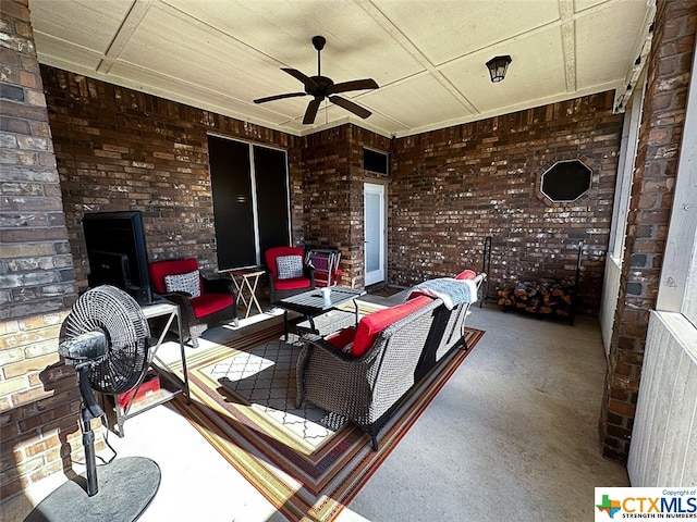 view of patio with outdoor lounge area and ceiling fan