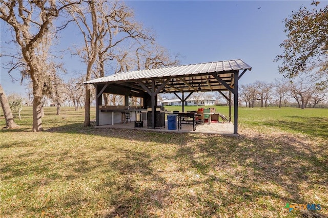 view of yard with a gazebo and a patio area