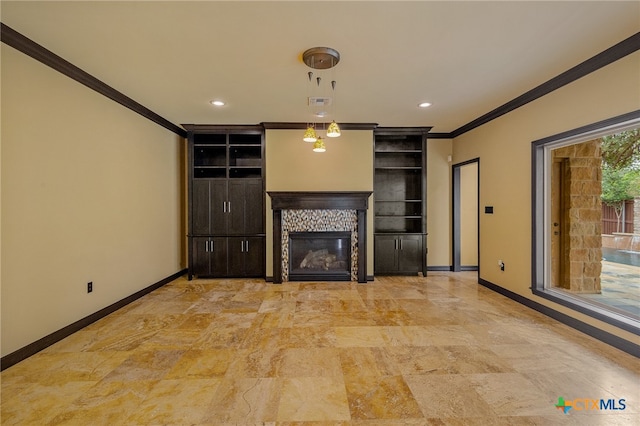 unfurnished living room featuring ornamental molding and a fireplace