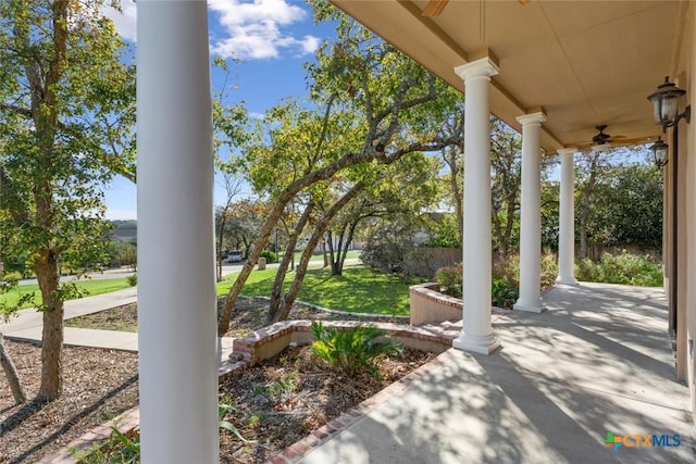 view of patio featuring ceiling fan and covered porch