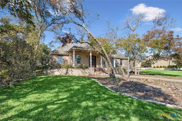 view of front facade with a front lawn