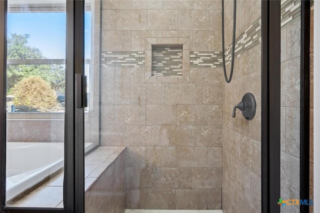 bathroom with separate shower and tub