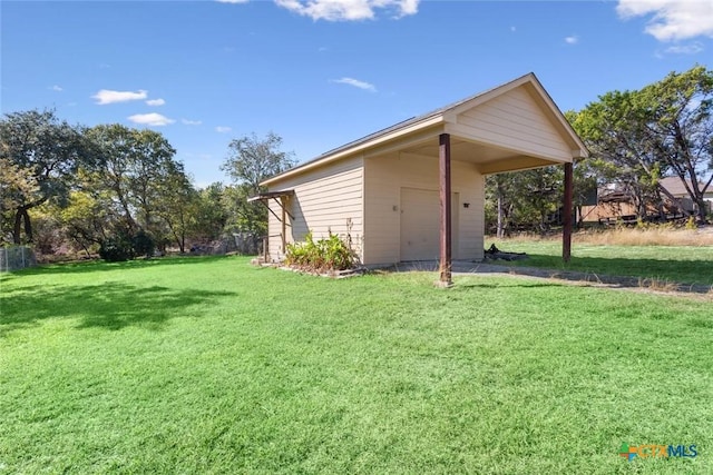 view of yard featuring a carport