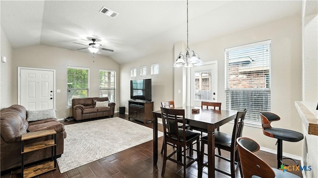 557/561 Creekside Cir, New Braunfels, TX 78130 - dining space featuring ceiling fan, dark wood-style flooring, lofted ceiling, and a chandelier