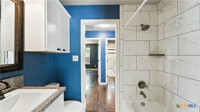 543 Scenic Terrace Dr, Canyon Lake, TX 78133 - full bathroom with shower / bathtub combination, vanity, and wood finished floors