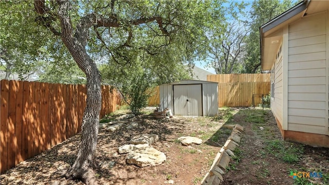 543 Scenic Terrace Dr, Canyon Lake, TX 78133 - fenced backyard featuring a storage shed