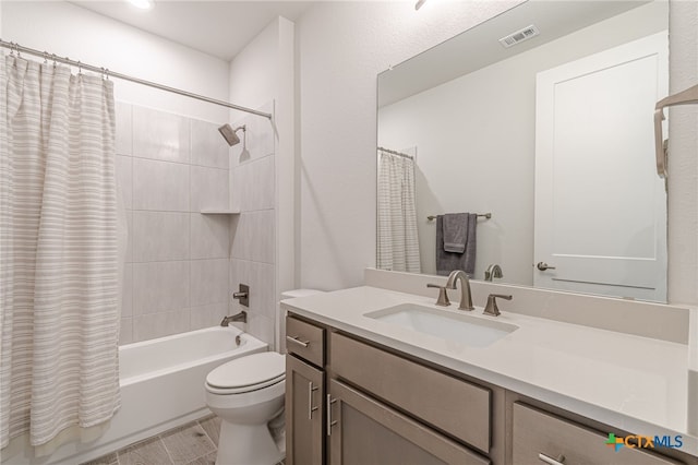 full bathroom featuring vanity, shower / bath combination with curtain, and toilet