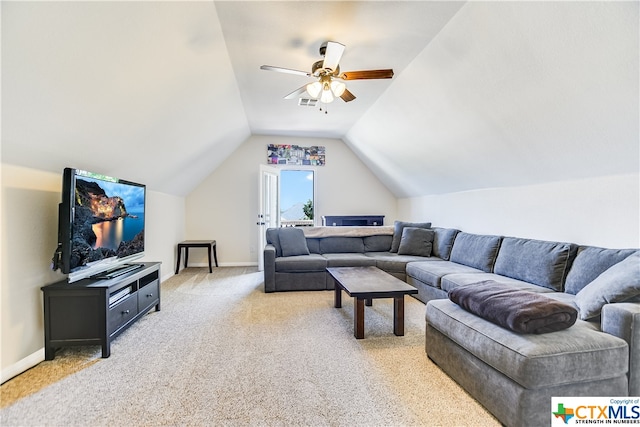 carpeted living room featuring lofted ceiling and ceiling fan