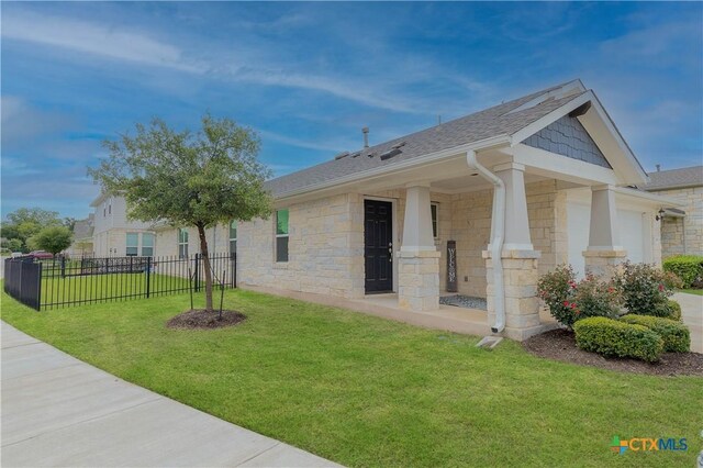 2800 Joe Dimaggio Blvd Unit 95, Round Rock, TX 78665 - view of side of property featuring stone siding, roof with shingles, and a porch