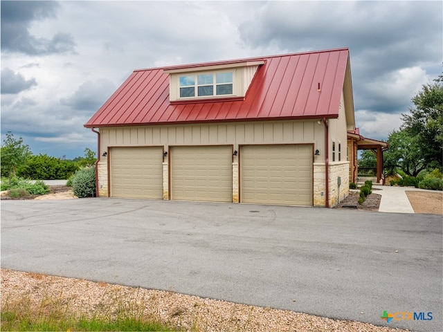 exterior space with a garage