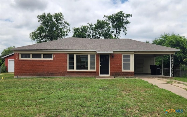 201 W Young Ave, Temple, TX 76501 - ranch-style home with brick siding, an attached carport, concrete driveway, and a front yard