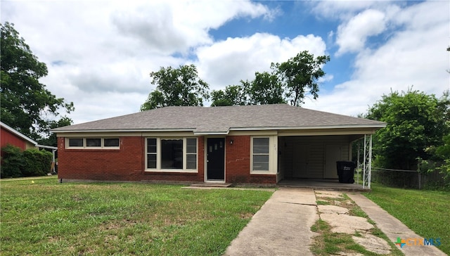 201 W Young Ave, Temple, TX 76501 - ranch-style home featuring driveway, brick siding, and a carport