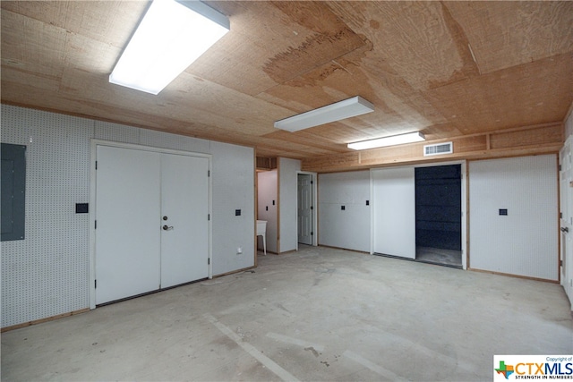 basement featuring electric panel