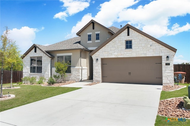 1386 Lyme Park, Bulverde, TX 78163 - french country home with stone siding, stucco siding, driveway, roof with shingles, and an attached garage