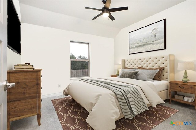 1386 Lyme Park, Bulverde, TX 78163 - carpeted bedroom featuring vaulted ceiling and ceiling fan