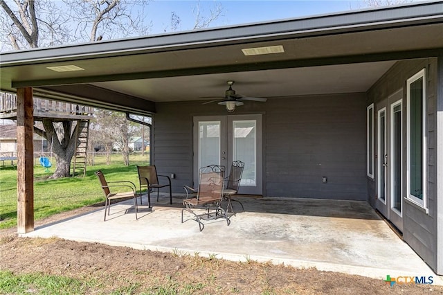 view of patio with ceiling fan