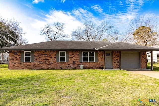 ranch-style home with a garage and a front lawn