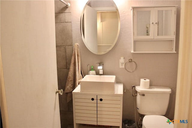 110 Crockett St, Port Lavaca, TX 77979 - bathroom featuring vanity and toilet