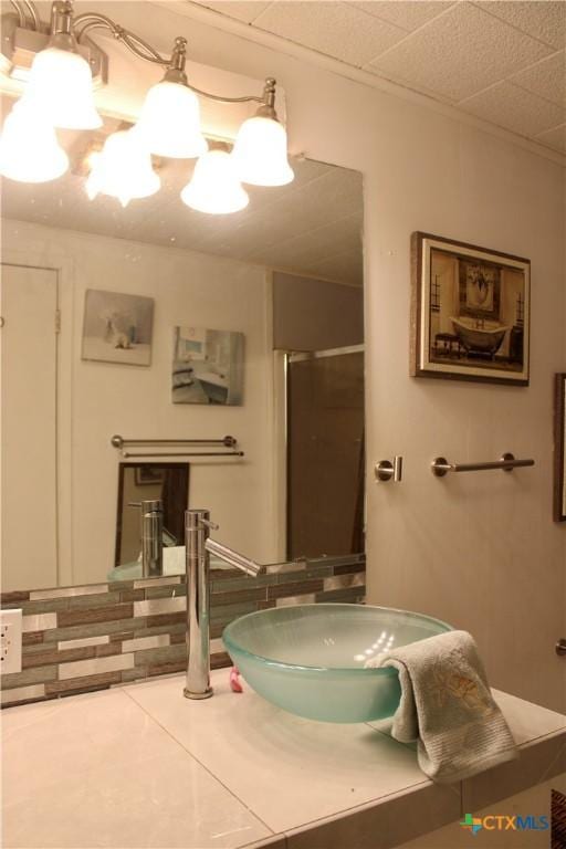 110 Crockett St, Port Lavaca, TX 77979 - bathroom with a stall shower, tile patterned flooring, and vanity