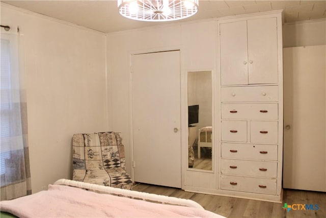 110 Crockett St, Port Lavaca, TX 77979 - bedroom with wood finished floors and crown molding