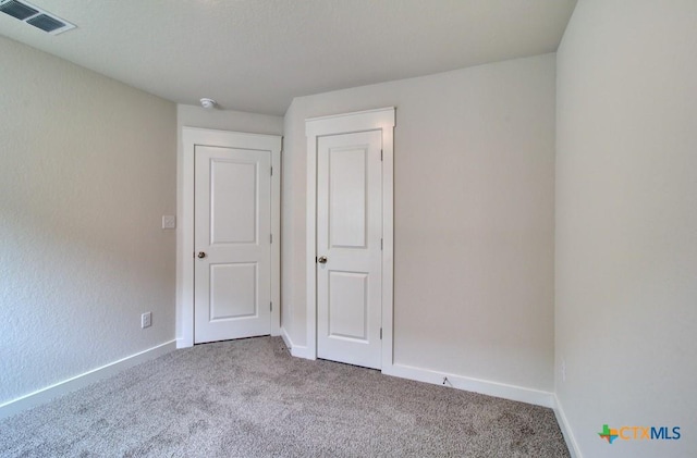 980 Gray Cloud Dr, New Braunfels, TX 78130 - unfurnished bedroom featuring carpet floors and baseboards