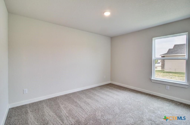 980 Gray Cloud Dr, New Braunfels, TX 78130 - carpeted empty room featuring baseboards and recessed lighting