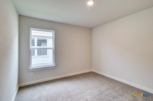 980 Gray Cloud Dr, New Braunfels, TX 78130 - spare room featuring carpet floors and baseboards