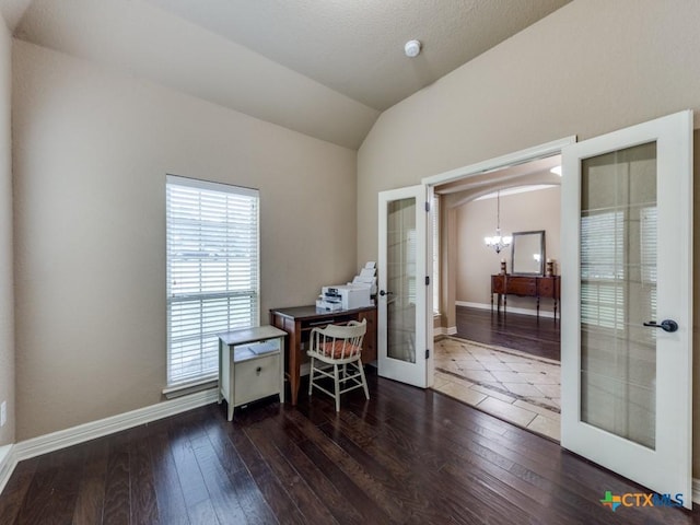 office with french doors, vaulted ceiling, a chandelier, and dark hardwood / wood-style floors