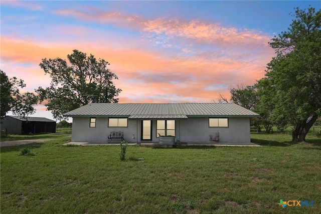 1035 Pine Meadow Rd, Seguin, TX 78155 - back of house featuring a yard and metal roof