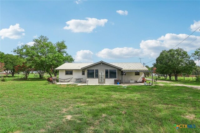 1035 Pine Meadow Rd, Seguin, TX 78155 - back of house with a patio and a yard