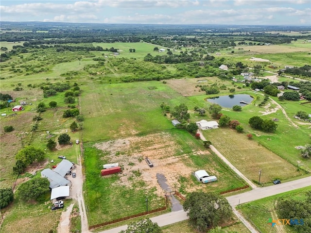 1035 Pine Meadow Rd, Seguin, TX 78155 - aerial view with a water view and a rural view