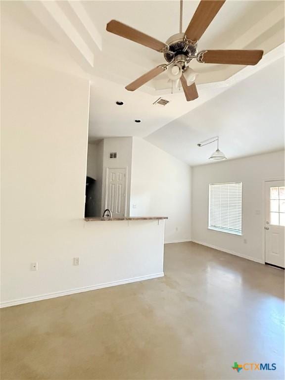 209 Anne Louise Dr, New Braunfels, TX 78130 - spare room with visible vents, finished concrete floors, baseboards, lofted ceiling, and ceiling fan