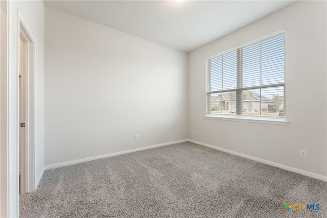 unfurnished room with carpet