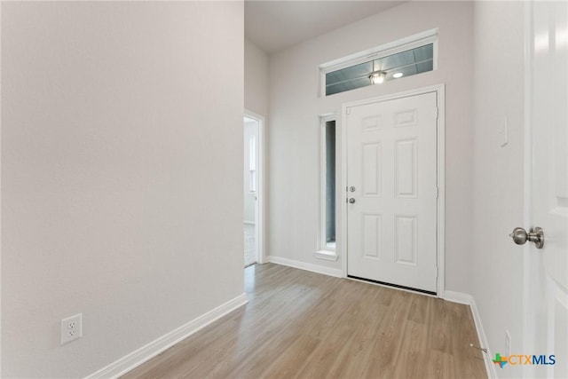 entryway with light wood-type flooring