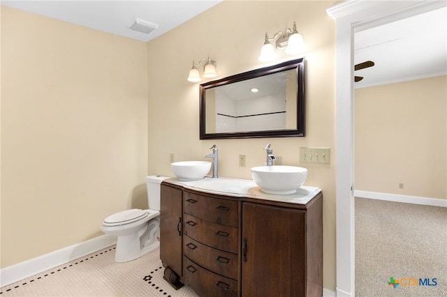 395 Dale Ln, Dale, TX 78616 - full bath with baseboards, double vanity, and toilet
