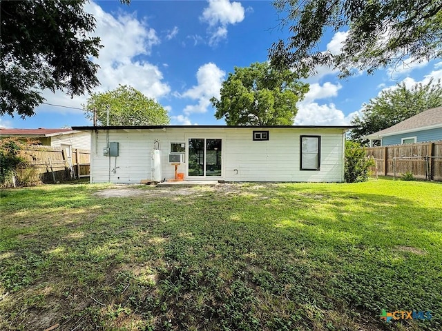 3007 Meadowlane St, Victoria, TX 77901 - rear view of property with water heater