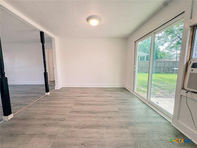 3007 Meadowlane St, Victoria, TX 77901 - spare room featuring wood finished floors and baseboards