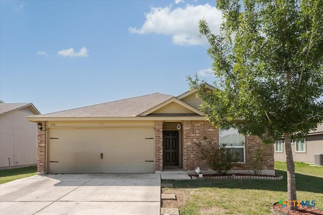 ranch-style house with a front yard and a garage