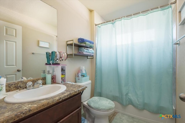 full bathroom featuring toilet, vanity, shower / tub combo with curtain, and tile patterned flooring