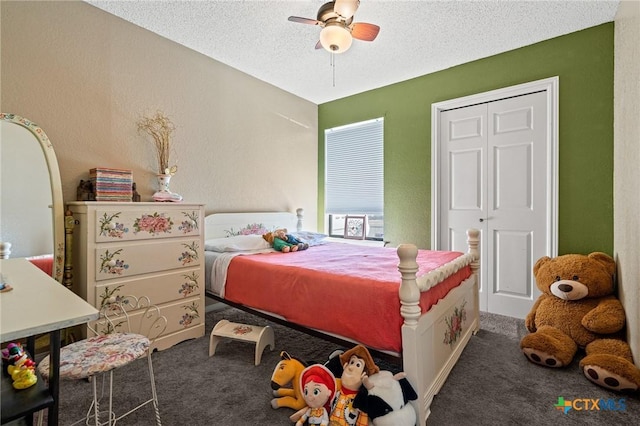 bedroom featuring a textured ceiling, a closet, ceiling fan, and carpet flooring