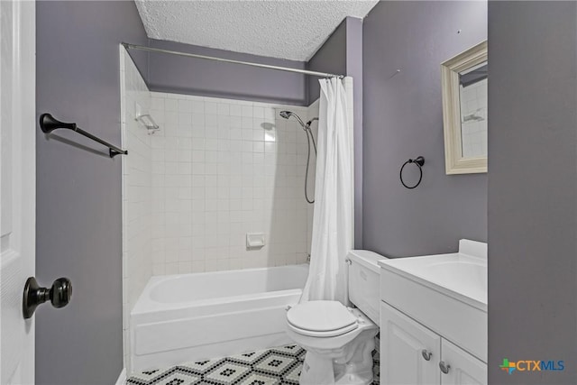 full bathroom with vanity, toilet, shower / bathtub combination with curtain, and a textured ceiling