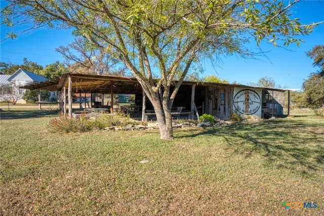 exterior space with a lawn