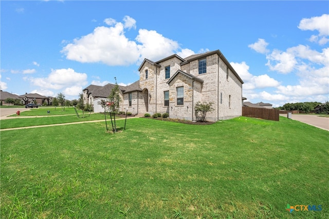 exterior space featuring a front lawn