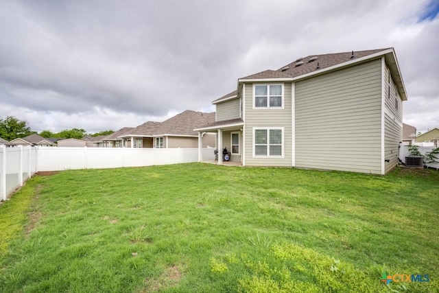 9012 Huxley Dr, Providence Village, TX 76227 - rear view of house with central air condition unit and roof with shingles